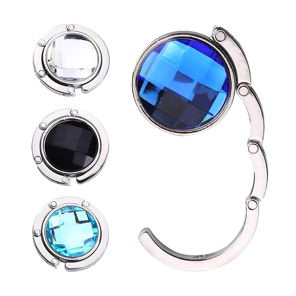 Erhalten Sie Ordnung und Stil mit unserem Foldable Handbag Hanger Holder Set. Praktisch platzsparend und elegant - 4 Stück für Ihr Büro oder unterwegs. Jetzt Ihre Handtaschen sicher aufbewahren