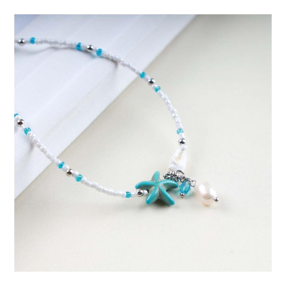Elegantes Strand-Accessoire Boho Fußkettchen mit Seestern und weißen Perlen für Frauen – Sommerliches Knöchelarmband in Blau