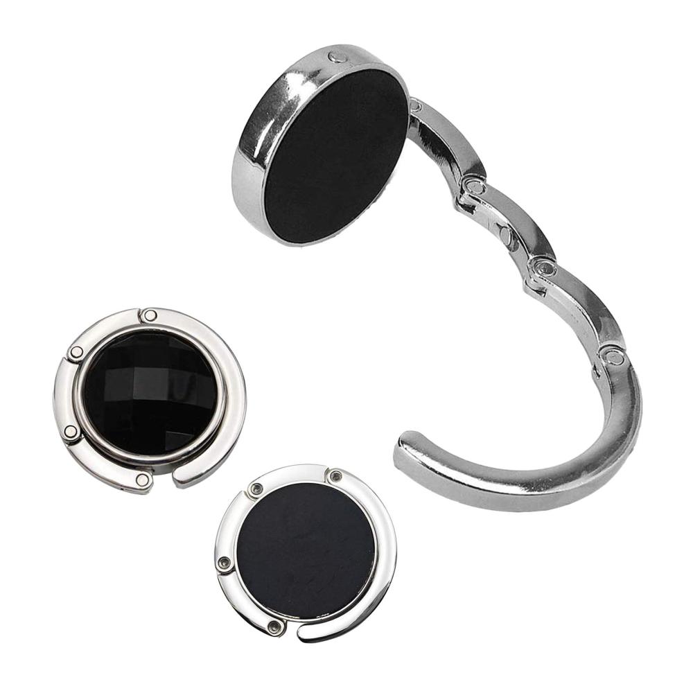 Erhalten Sie Ordnung und Stil mit unserem Foldable Handbag Hanger Holder Set. Praktisch platzsparend und elegant - 4 Stück für Ihr Büro oder unterwegs. Jetzt Ihre Handtaschen sicher aufbewahren