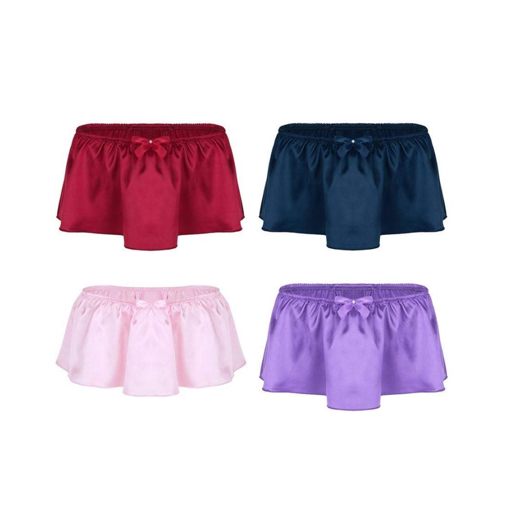 Erleben Sie ultimative Eleganz Glänzende Satin-Sissy-Rockleder mit Schleifchen-Thongs für Herren. Verführerische Strings für jeden Geschmack. Jetzt entdecken