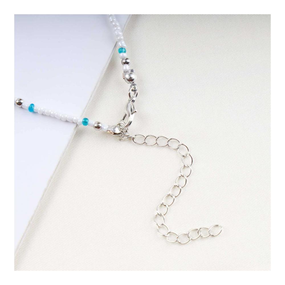 Elegantes Strand-Accessoire Boho Fußkettchen mit Seestern und weißen Perlen für Frauen – Sommerliches Knöchelarmband in Blau